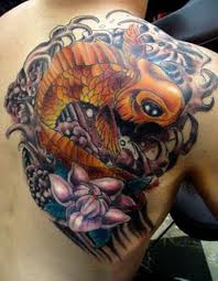 The shading that is usually done on them in a rainbow technique is so colorful but calm at the same time. The Colorful Koi Fish Tattoo And Meanings Tattooswin