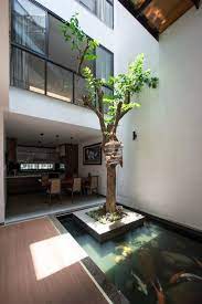 Gambar kolam minimalis sederhana dengan air mancur. Buat Rumah Sejuk Ini 12 Inspirasi Desain Kolam Ikan