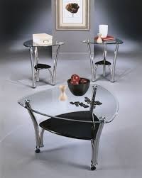 Triangular Glass Coffee Table And Matching End Tables Are A Lovely Addition To A Modern Room Coffee Table 3 Piece Coffee Table Set Stylish Coffee Table