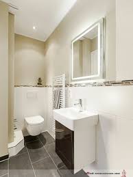 Clean Lines In The Guest Bathroom With Shower Toilet And Hand Basin Are Modern Abg Gray Bathroom Decor Bathroom Decor Luxury Guest Bathroom Small