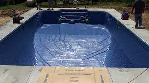 How to put a pool liner in. How To Install A Vinyl Swimming Pool Liner On A Pool Kit From Pool Warehouse Youtube