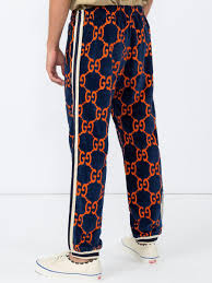 Gucci Tracksuit Pants Cheap Online Web striping down the sleeve and leg complete with intricate details like delicate blossom appliqué. wt agenda