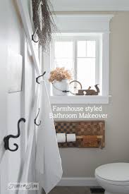 Never underestimate the transformative power of unique bathroom sinks. Salvaged Farmhouse Bathroom Makeover With Vintage Trim