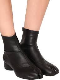 Since margiela introduced an iteration of the tabi boot for men last season, they've been appearing on the feet of many a male — though that never stopped some from squeezing into smaller sizes before now. Maison Margiela 30mm Tabi Faux Leather Sock Boots In Black Lyst
