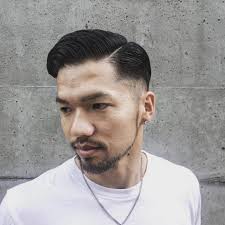 Man with low taper fade on curly hair credit: 60 Perfect Low Top Fade Haircuts Forever Classy 2021