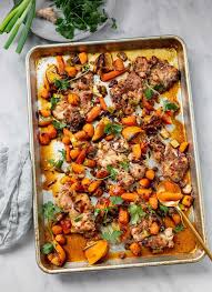 Roasted Sheet Pan Chicken With North African Spices Fresh Orange And Carrots Is An Easy One Pan Chic In 2020 Chicken Dinner Recipes Pan Chicken South American Dishes