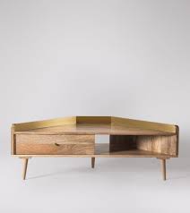 A tv stand with mount is one of the safest options as it ensures the tv is secure and won't fall off the stand. Fresco Mid Century Style Corner Tv Stand In Brass Natural Mango Wood Corner Tv Corner Tv Stand Corner Tv Table