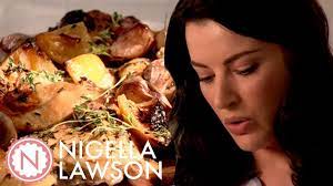 Remove the chicken from the marinade and wipe totally dry with kitchen towel. Nigella S Slowed Roasted Garlic Lemon Chicken Forever Summer With Nigella Youtube