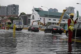Flash floods disrupted traffic, ruined cars and got people soaking wet in singapore. How Do You Figure Out Whether To Drive Through A Flash Flood Or Not Torque