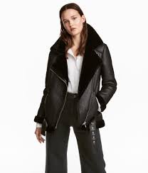 Black Faux Fur Oversized Biker Jacket With A Large Collar Diagonal Zip At Front And Front Winter Fashion Outfits Casual Outerwear Trends Fur Leather Jacket