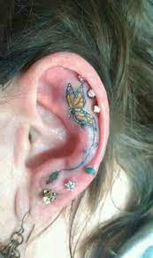 Millennium Tattoo Buffalo I Want One Of These So Bad Ear Tattoo Ear Lobe Tattoo Behind The Ear Tattoo