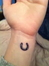 What does a horseshoe wrist tattoo mean? Black Horseshoe Tattoo On Wrist