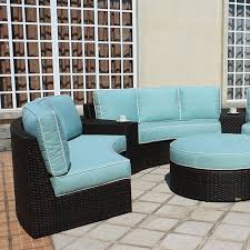 Patio Renaissance S Del Mar Sectional Features A Curved Seating Arrangement To Encourage Convers Outdoor Furniture Sets Curved Sectional Wicker Patio Furniture