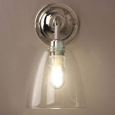 Easily fits on a pancake junction box. Pluckley Bathroom Wall Light With Clear Glass Shade