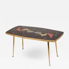 It's not common to leave money on the table. A Mid Century German Coffee Table With A Mosaic Top On Brass Metal Legs