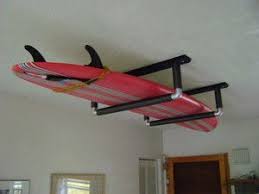 Showcasing Some Surf Board Designs And Surf Board Decor Fashion At The Beach Taking Time To Appreciat Paddle Board Storage Paddleboard Rack Sup Paddle Board