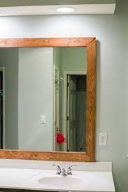 Maybe you would like to learn more about one of these? How To Diy Upgrade Your Bathroom Mirror With A Stained Wood Frame Building Our Rez