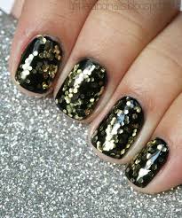 Black and gold are traditional new year's eve colors, but you can add star embellishments to make them feel fresh. 10 New Years Eve Manicure Ideas Creative Nails Nye Slapdashmom Com