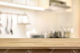 Download free png of png kitchen table transparent background with cute home interior by marinemynt about background, background png, beige. Wood Table Top As Kitchen Island On Blur Kitchen Background Stock Photo Picture And Royalty Free Image Image 57077642