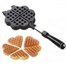 It comprises two metal plates with a connecting hinge, molded to create the honeycomb pattern found on waffles. Treasure House Stovetop Cast Alluminium Waffle Iron Belgian Heart Waff