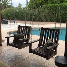 A swing is a seat, often found at playgrounds for children, at a circus for acrobats, or on a porch for relaxing, although they may also be items of indoor furniture, such as the latin american hammock or the indian oonjal. Porch Swing Bench Outdoor Seating Rope Swing Tree Swing In 2021 Porch Swing Chair Porch Swing Porch Glider
