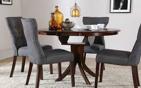 Hudson Round Dark Wood Extending Dining Table And 4 Chairs Set Bewley Slate Round Wood Dining Table Round Dining Room Table Round Dining Room
