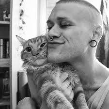 Nicholas John and Pizza, an appropriate first photo with my new Nikon!  We're baa-aack!