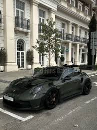 Image result for Black Olive 2025 Porsche