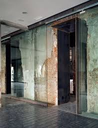 The Black Workshop Brick And Glass Wall Architecture Design Interior Wall Design Architecture