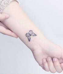Experiment with combining tattoo styles, like this classical butterfly outline with the. Amazing Finger Butterfly Tattoo Best Butterfly Tattoos Best Tattoos Momcanvas