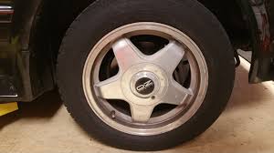 Visually inspect the wheel face and locate the notch in between the center cap and the wheel. Pos Oz Wheel Center Caps Help Toyota Celica Supra Forum