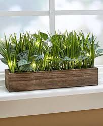 Lighted Faux Grass Planters In 2020 Faux Grass Plant Decor Faux Plants