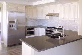Antique White Kitchen Cabinet With Grey Quartz Countertop Undermount Sink And Pull Antique White Kitchen Cabinets White Modern Kitchen Antique White Kitchen