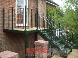 Steel Fabricators Of Balconies Staircases External Steel Staircase Allowing Access To The Side Of The Property F Exterior Stairs Timber Deck Timber Staircase
