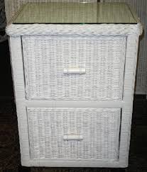 Wicker filing cabinet is sturdily designed to optimize organization with dual drawers that can be arranged for standard size hanging folders. Rattan File Cabinet