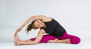 Lift your right arm toward the ceiling and gaze toward the right hand. 3 Yoga Poses To Stretch Your Side Body Doyou