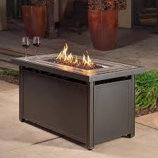 This table features durable steel construction with a top that is wide enough for drinks to rest on while you and your guests enjoy the warm flame. Creative Outdoor Solutions 47 64 In W 55000 Btu Brown Aluminum Propane Gas Fire Pit Lowes Com Outdoor Solutions Fire Pit Gas Firepit