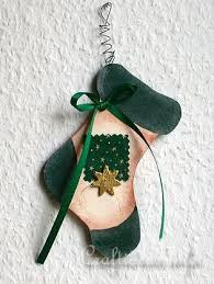 The houses are bottomless so you can just place treats underneath for your kids to lift. Wood Crafts With Free Patterns Christmas Scrollsaw Project Wooden Christmas Stocking