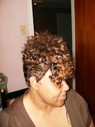 Shaved sides hairstyle with weave Mohawk Weave