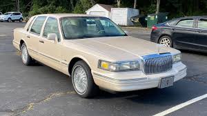 Image result for Ivory 1997 Town Car