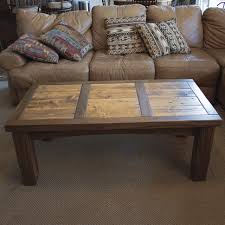The open, geometric design on this rustic coffee table creates the perfect focal point in your living room or sitting room. Colorado Rustic Walnut Barnwood Coffee Table