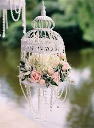 The options for design variations are plenty from simple, floral, rustic to vintage. Using Bird Cages For Decor 66 Beautiful Ideas Digsdigs