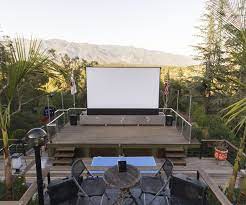 An outdoor movie night isn't just for a park or public lawn — you can create a diy backyard movie theater of your own! 3 Awesome Outdoor Home Theater Systems Electronic House
