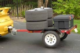 Towing a car with a tow bar. Retrofittable The Trailer Hitch For The Vehicle