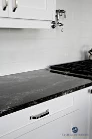 Black And White Quartz Countertops Cambria Ellesmere Black Quartz Countertop White Kitchen Cabinets And Off White White Kitchen Backsplash Gray Subway Tile Backsplash Kitchen Backsplash Designs