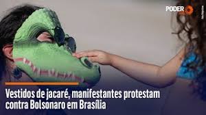 Em dezembro, bolsonaro disse que não tomará a vacina contra o novo coronavírus e disse, sem deixa outro tomar a vacina no meu lugar. Vestidos De Jacare Manifestantes Protestam Contra Bolsonaro Em Brasilia Poder360
