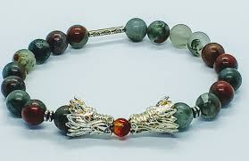 Dragonblood stone legends state that it is the petrified skin and blood of fallen dragons, including this one. Dragon Blood Stone Bracelet Pre Order