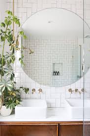 17 Incredibly Cool Bathrooms For Every Style Round Mirror Bathroom Amazing Bathrooms Bathroom Decor