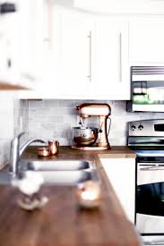 Cabinet handles in copper color as complement of an interior arrangement. Diy Brass Kitchen Hardware Kristi Murphy Diy Blog