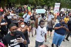 Demonstrators gather to protest shooting death of ahmaud arbery in brunswick, ga. Caravan Seeks Justice For Ahmaud Arbery At Saturday Rally Local News The Brunswick News